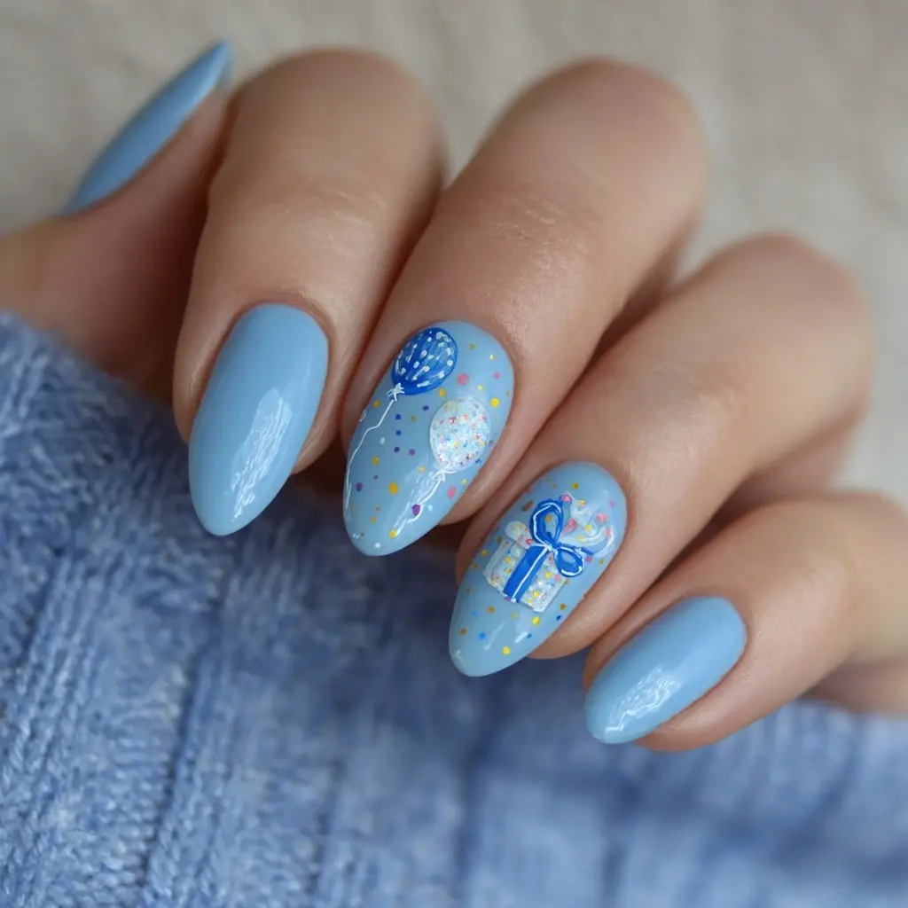 blue and pastel almond medium nails with floral and abstract