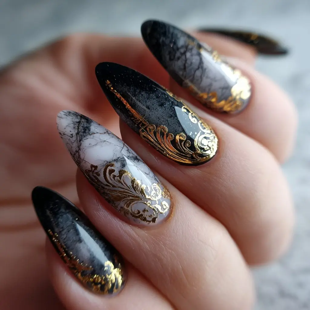 black and gold stiletto long nails with abstract and glitter