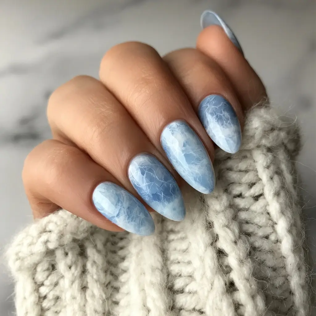 blue and pastel almond medium nails with ombre and glossy