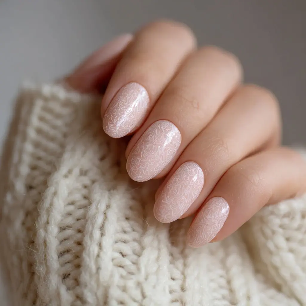 white and nude almond medium nails with floral and glossy