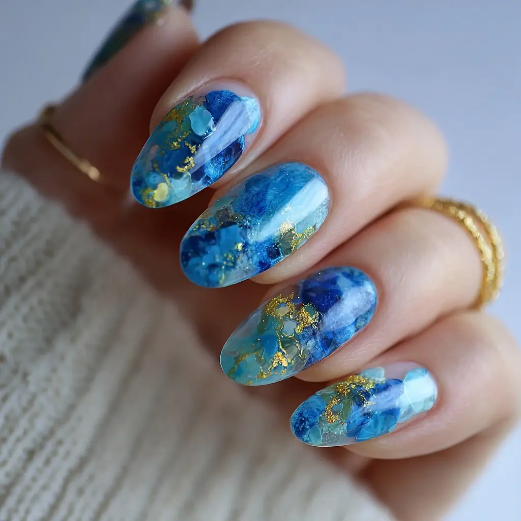 blue and white coffin medium nails with abstract and glossy