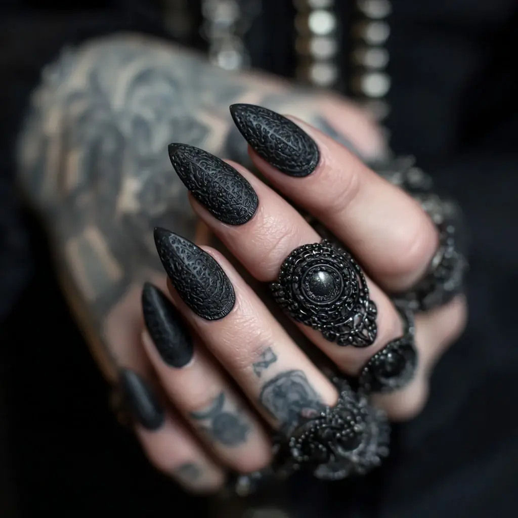 black stiletto long nails with matte and abstract