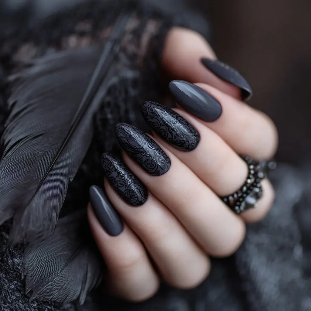 black and metallic stiletto long nails with minimalist and abstract