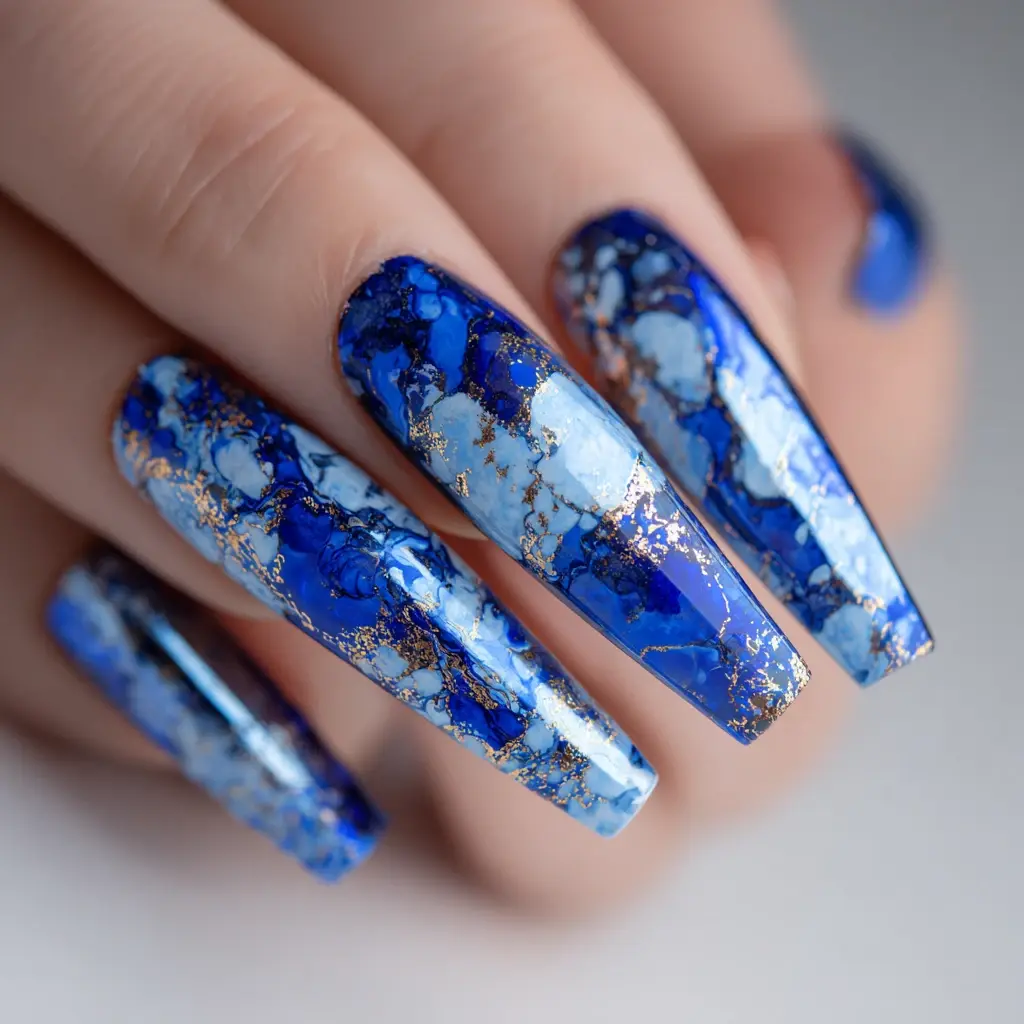 blue and metallic coffin long nails with abstract and glitter