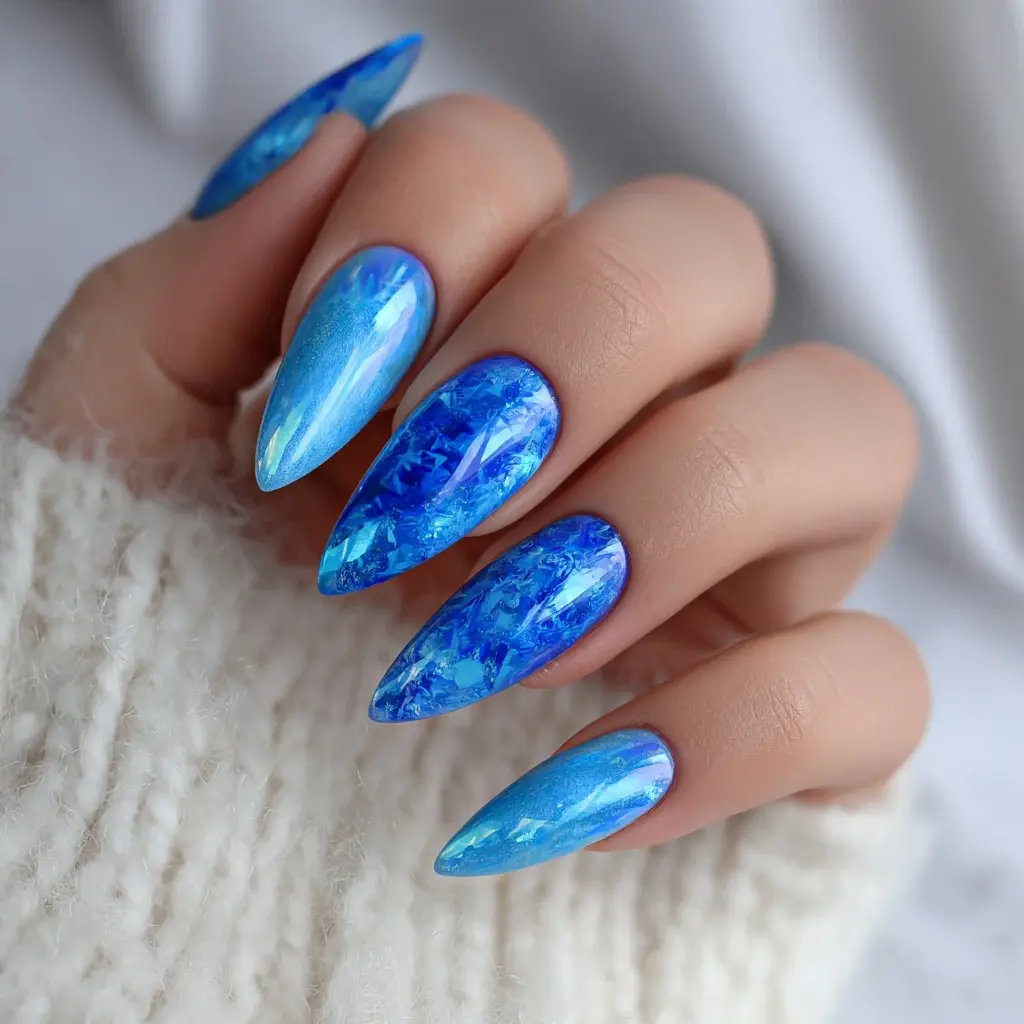 blue stiletto long nails with abstract and glossy