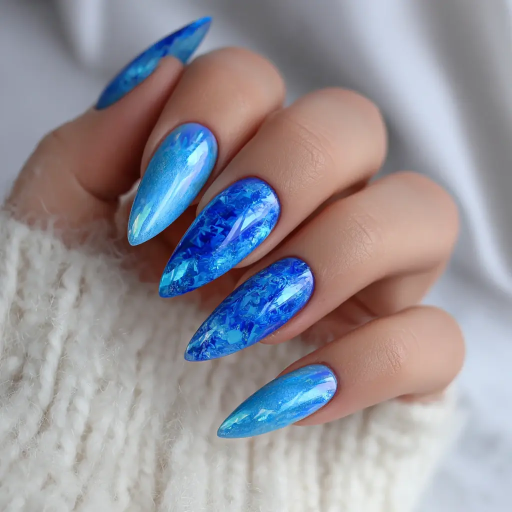 blue stiletto long nails with abstract and glossy