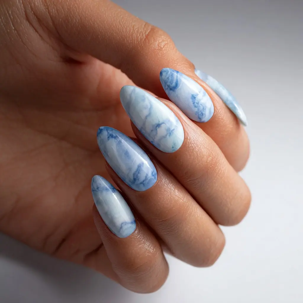 blue and white coffin long nails with abstract and glossy