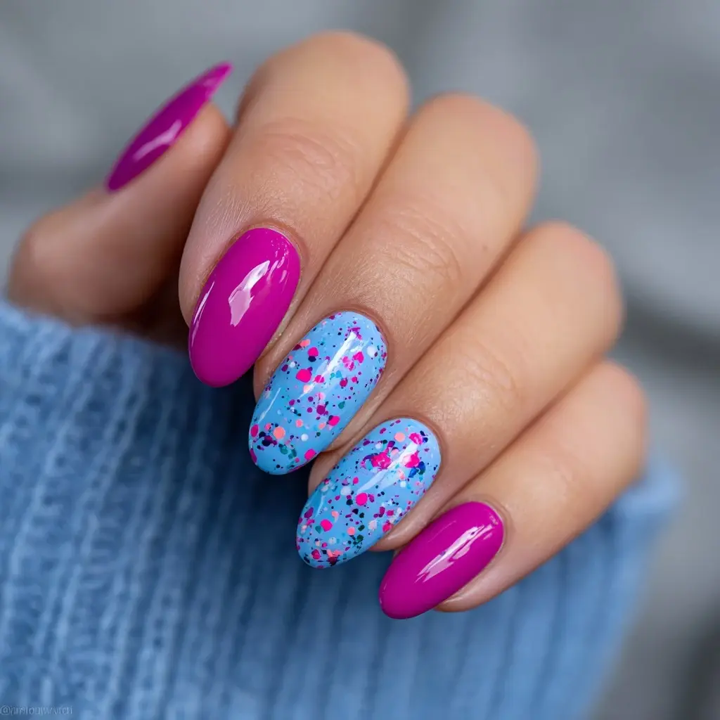 pink and blue almond medium nails with abstract and glitter