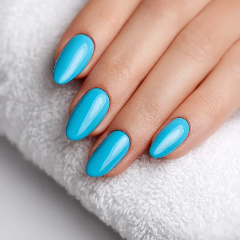 blue and pastel almond medium nails with glossy and minimalist